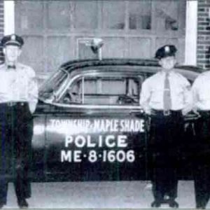 Historic Photo of officers and patrol car